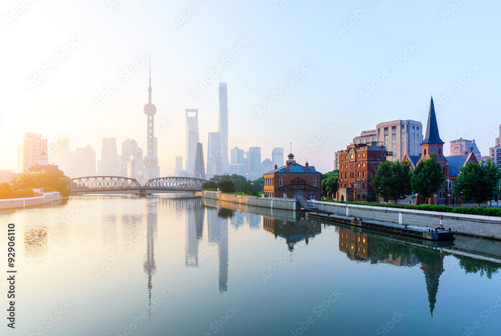 landmarks and a bridge of shanghai on the shore