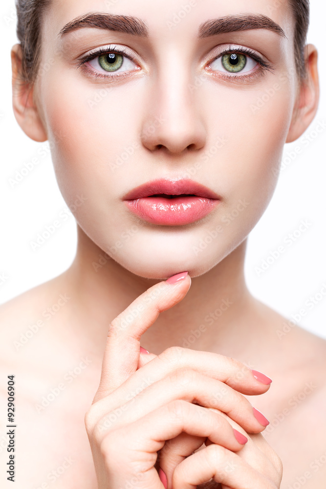 Young beautiful woman with day makeup and green pistachio colou Young beautiful woman with day makeup and green pistachio colou