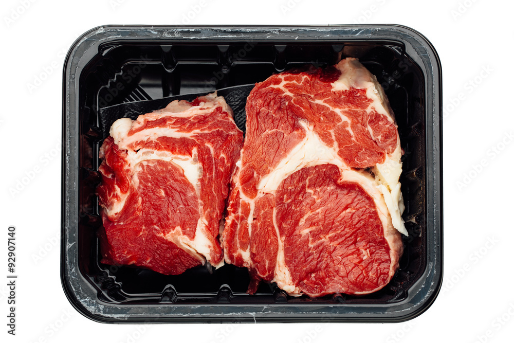 fresh raw meat in container, isolated on white fresh raw meat in container, isolated on white