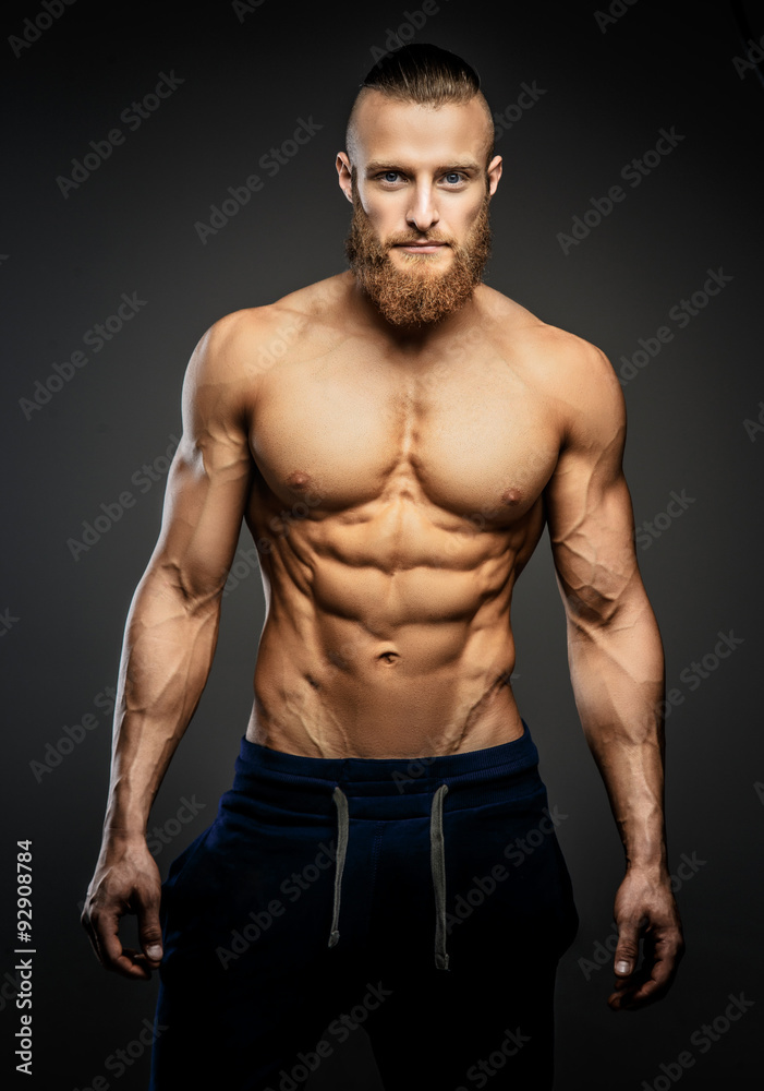 Athletic muscular bearded guy.