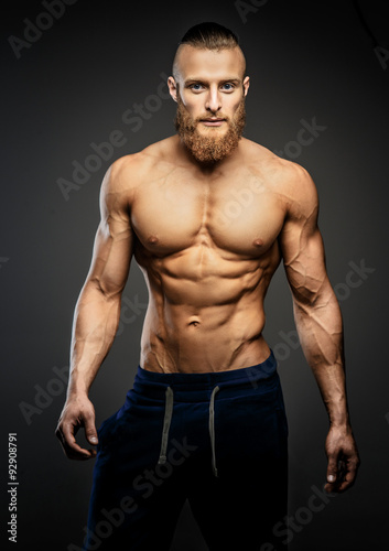 Athletic muscular bearded guy.