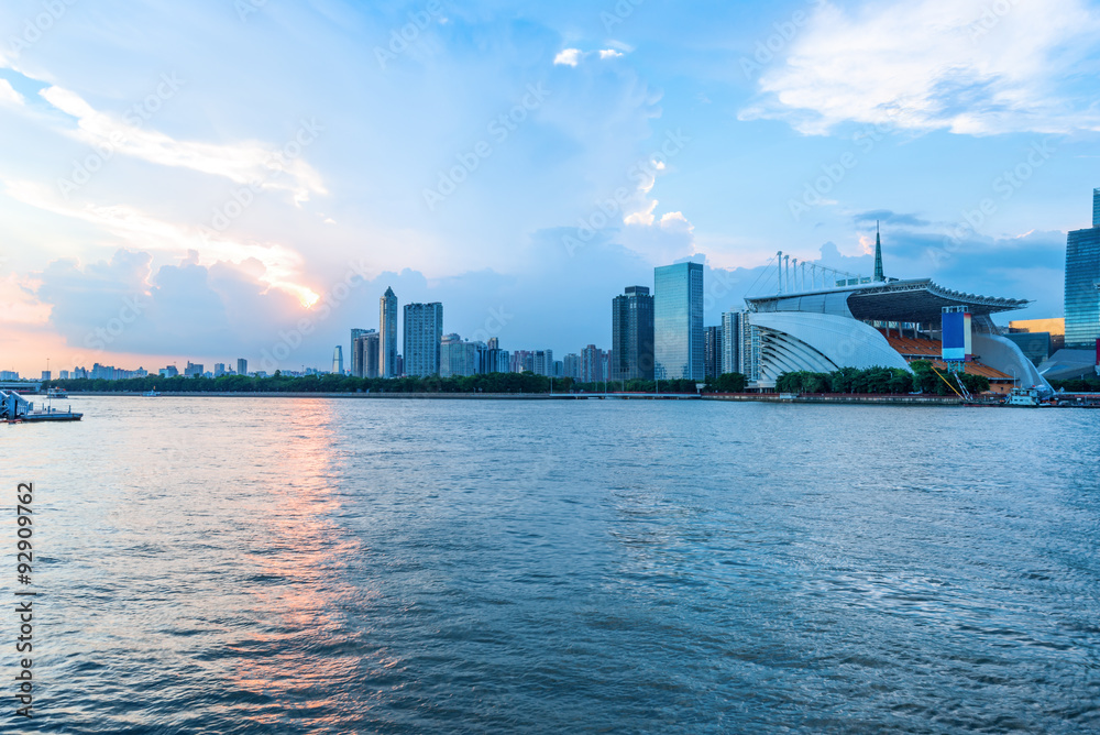 Obraz premium channel with skyscrapers aside