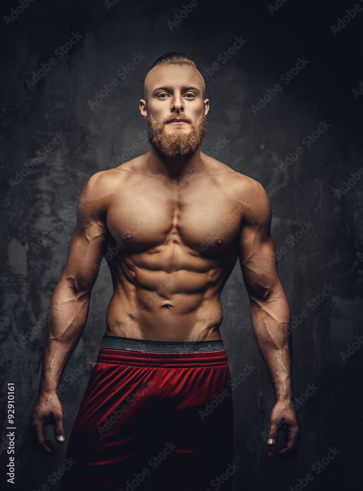 Portrait of strong muscular guy.