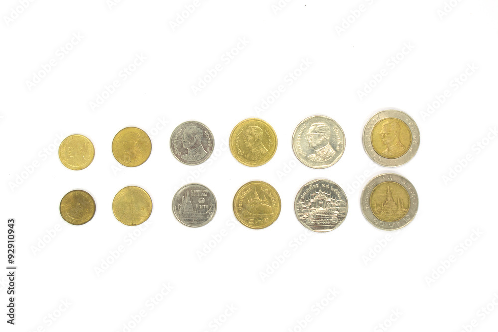 Old silver coins ranged from small to large, on a white background. Old silver coins ranged from small to large, on a white background.