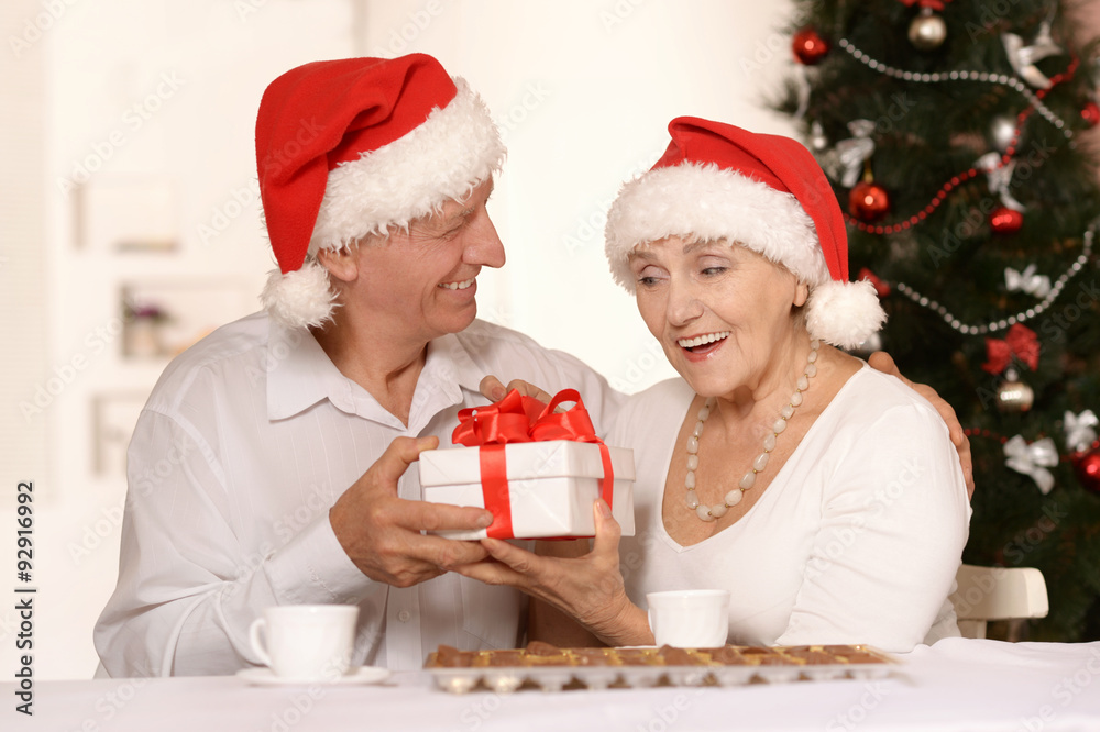 Amusing old couple at Christmas Amusing old couple at Christmas