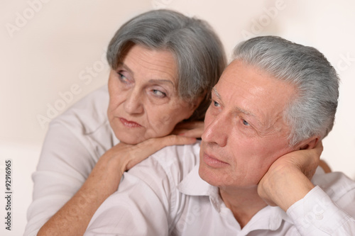 Sad senior couple