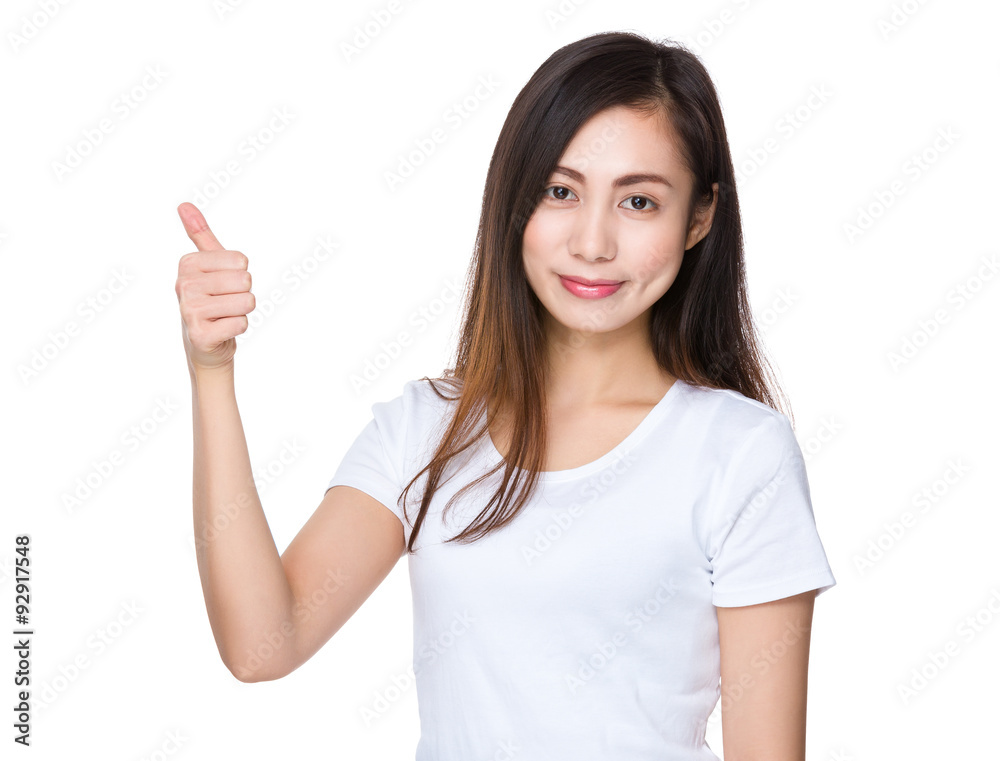 Asian woman showing thumb up gesture Asian woman showing thumb up gesture