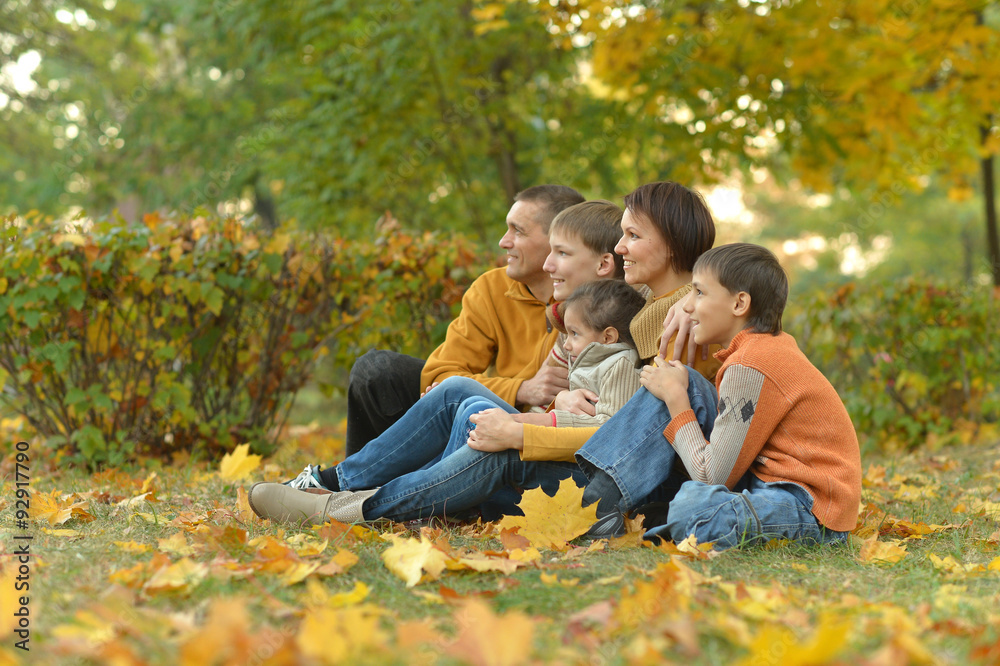 Happy family in autumn forest Happy family in autumn forest