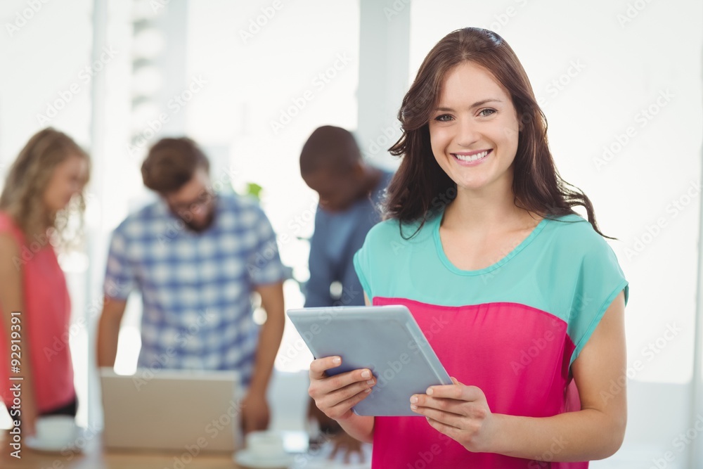 Portrait of happy woman using digital tablet Portrait of happy woman using digital tablet