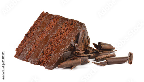 Fotografiet Chocolate cake slice with curl on white background