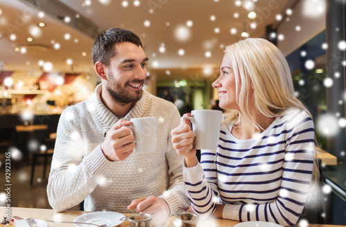 happy couple meeting and drinking tea or coffee