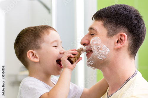 Cute child boy shaving his ...