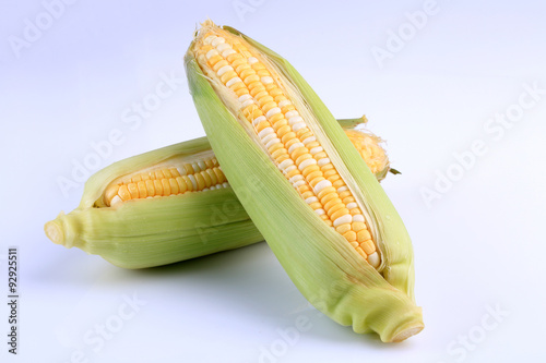 Organic fresh corns isolated on white background