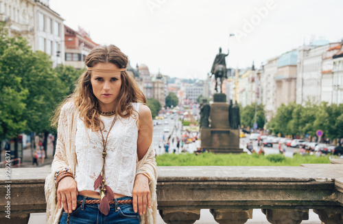 Bohemian woman tourist standing on Wenceslas Square, Prague photo