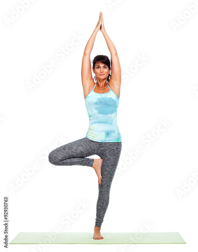 Young woman doing yoga.