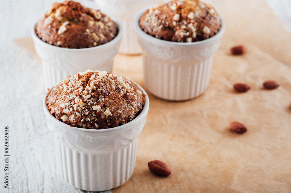 Homemade banana peanut muffins in ceramic baking form Homemade banana peanut muffins in ceramic baking form