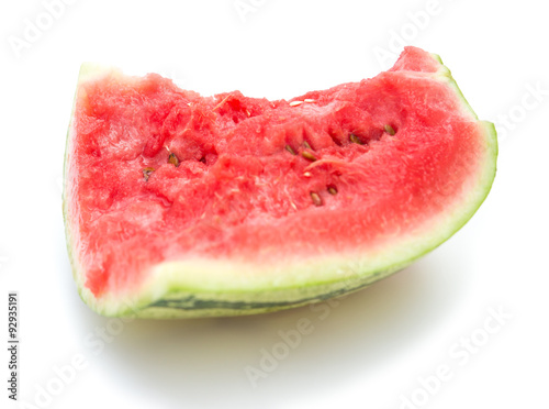a piece of watermelon on a white background