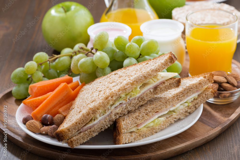 lunch with sandwiches, drinks and fruit lunch with sandwiches, drinks and fruit