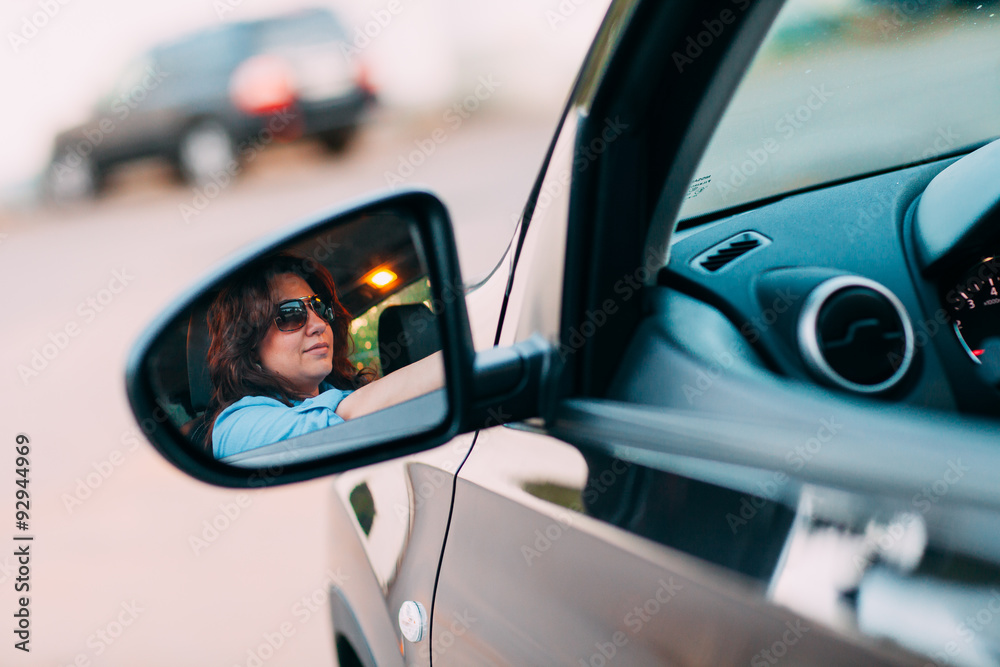 Beautiful woman driving her car