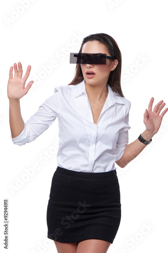 Beautiful business woman with futuristic glasses photo