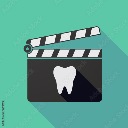 Long shadow clapper board with a tooth