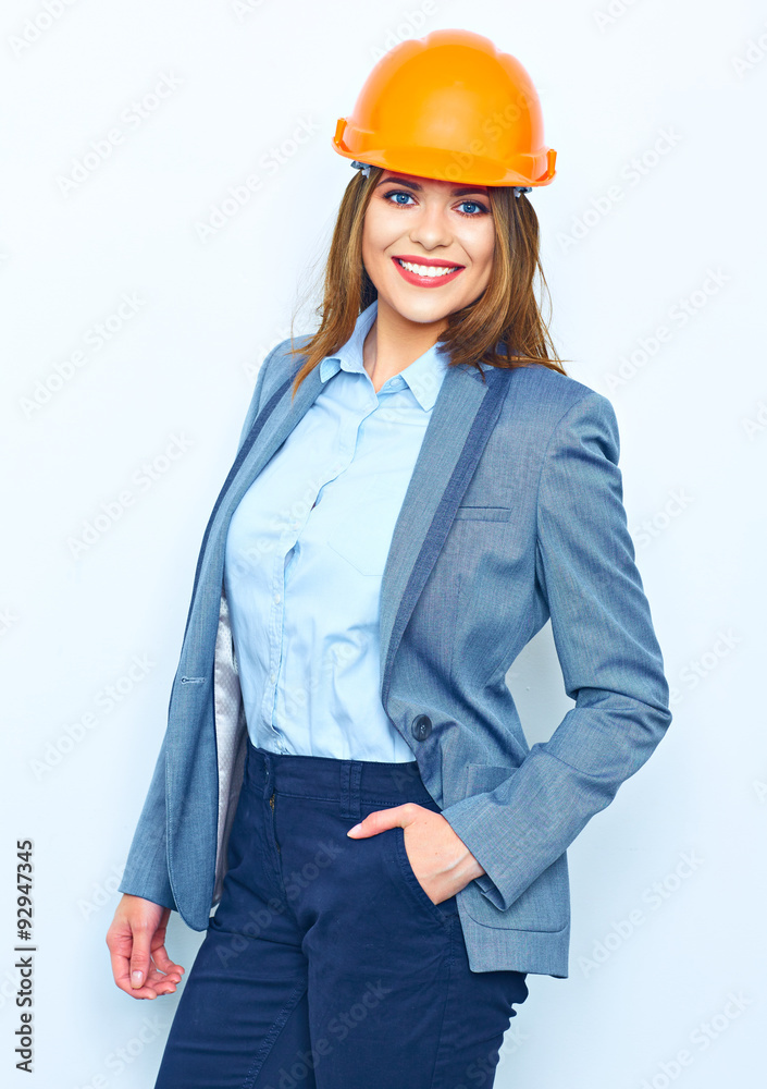 Young business woman portrait with buiding helmet. Young business woman portrait with buiding helmet.