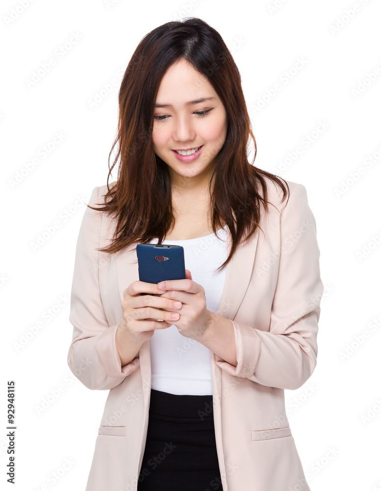 Asian young businesswoman use of the mobile phone Asian young businesswoman use of the mobile phone