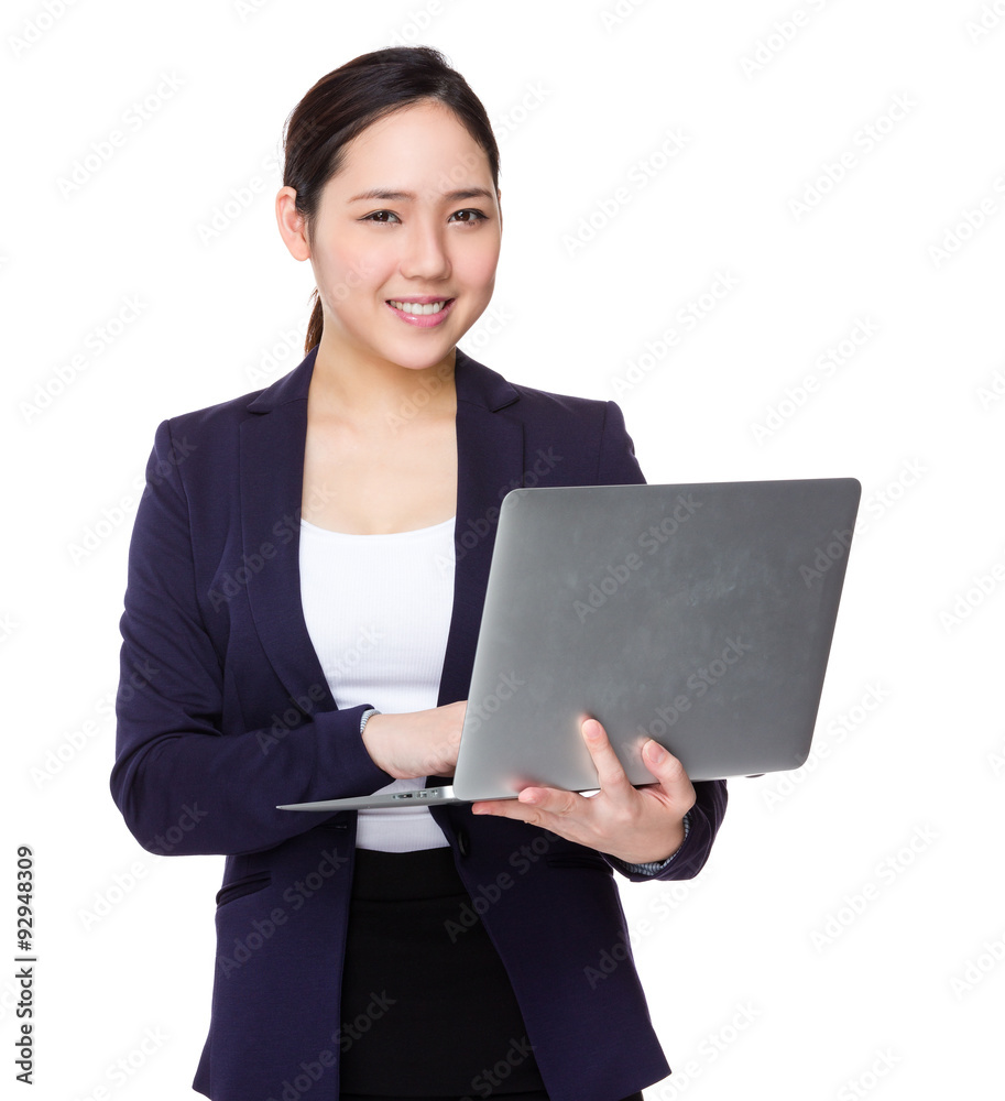 Young businesswoman use of the laptop computer Young businesswoman use of the laptop computer