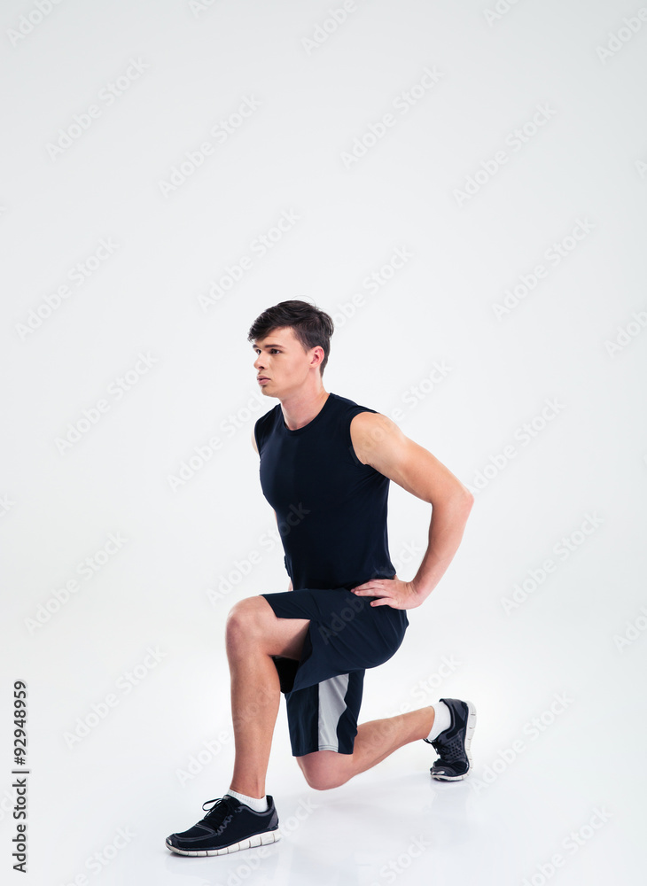 Sports man doing warm up exercises Sports man doing warm up exercises