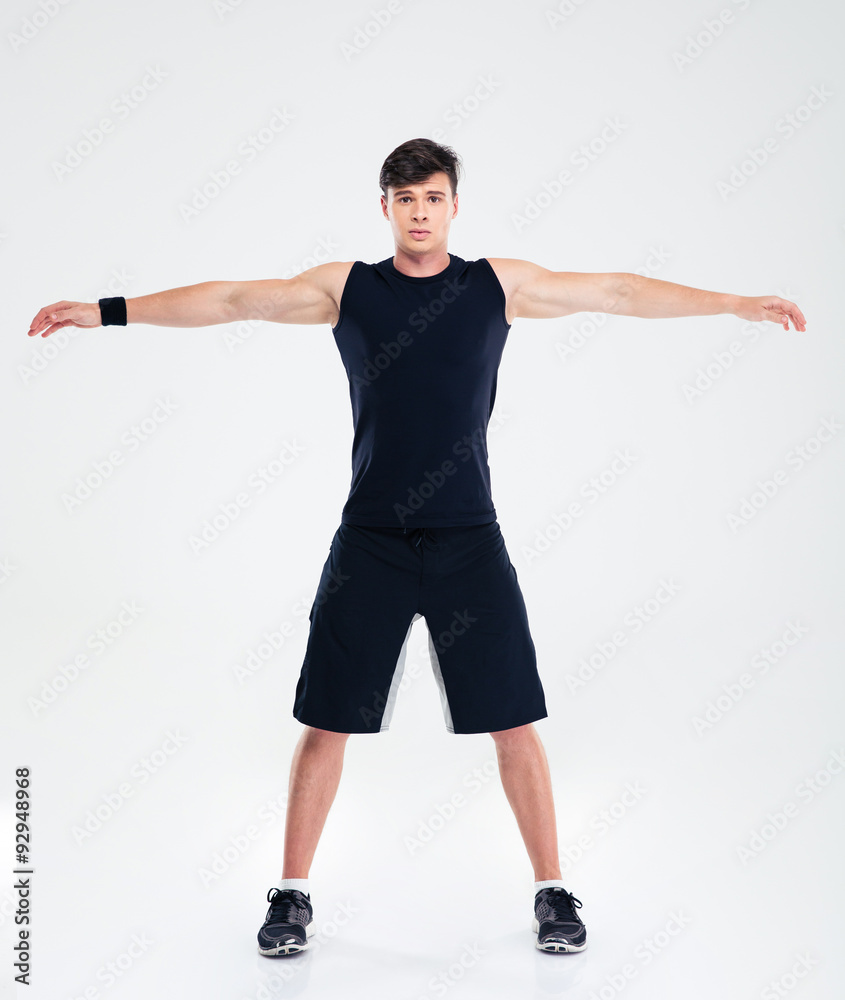 Fitness man doing warm up exercises