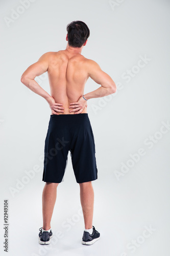 Athletic man having back pain