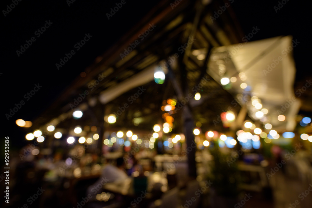 Night light blur bokeh at outdoor restaurant