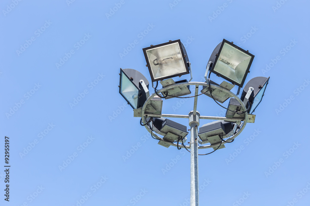 Spotlight, Stadium lights on blue sky Spotlight, Stadium lights on blue sky