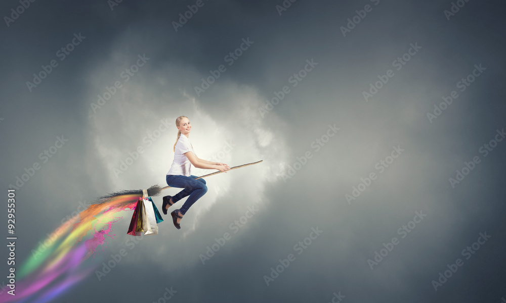 Girl fly on broom