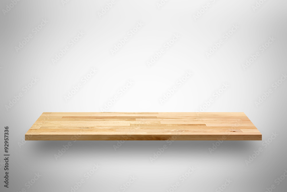 Empty wooden wall shelf on light gray background