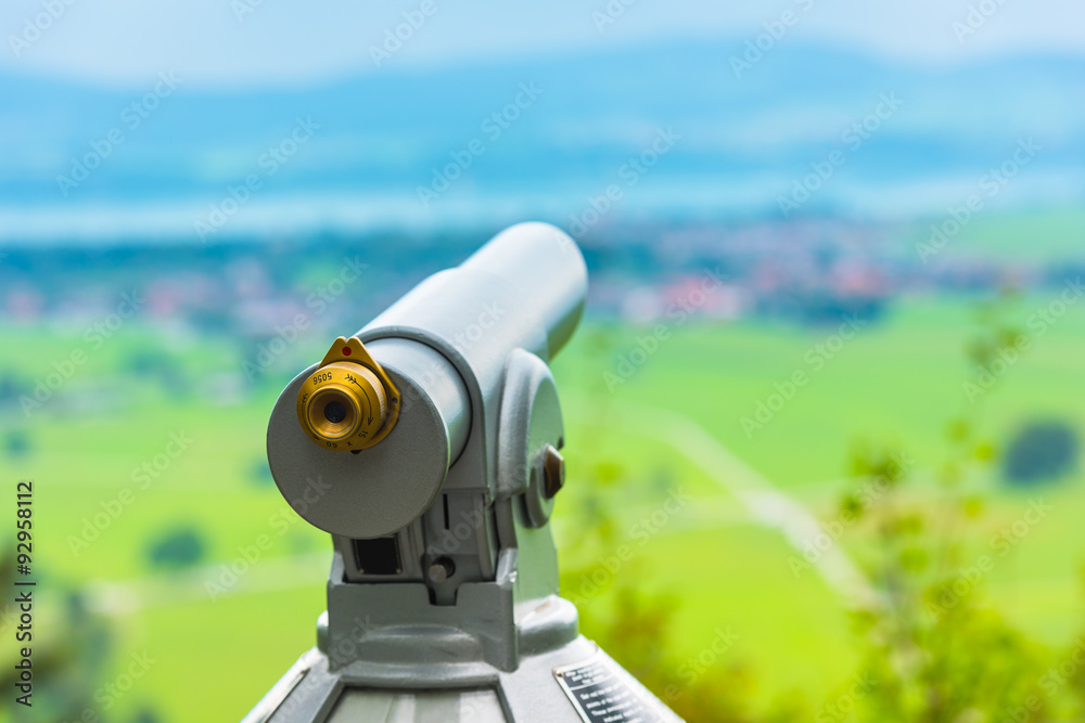 Image of a telescope overlooking for rural landscape