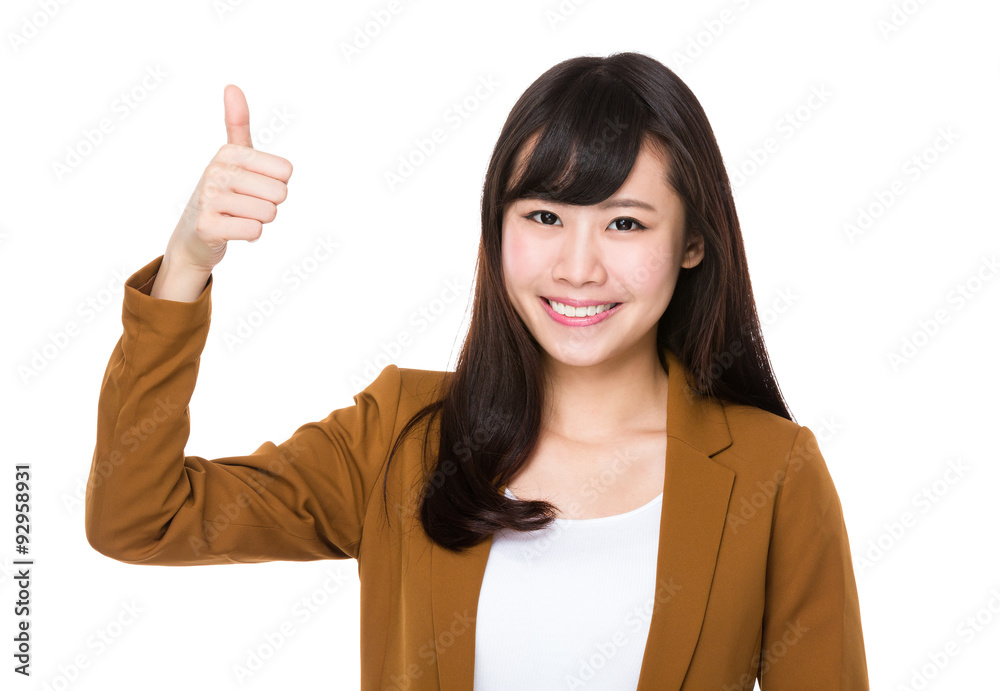 Asian businesswoman showing thumb up gesture Asian businesswoman showing thumb up gesture