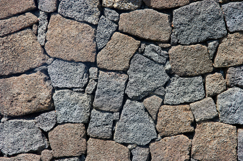Mur de pierres volcaniques
