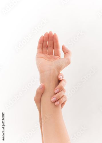 Two woman's hands demonstrating skincare