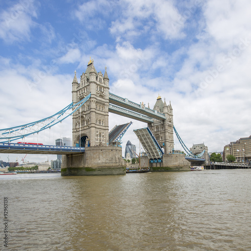 Tower Bridge with bascules raised, London, England, UK