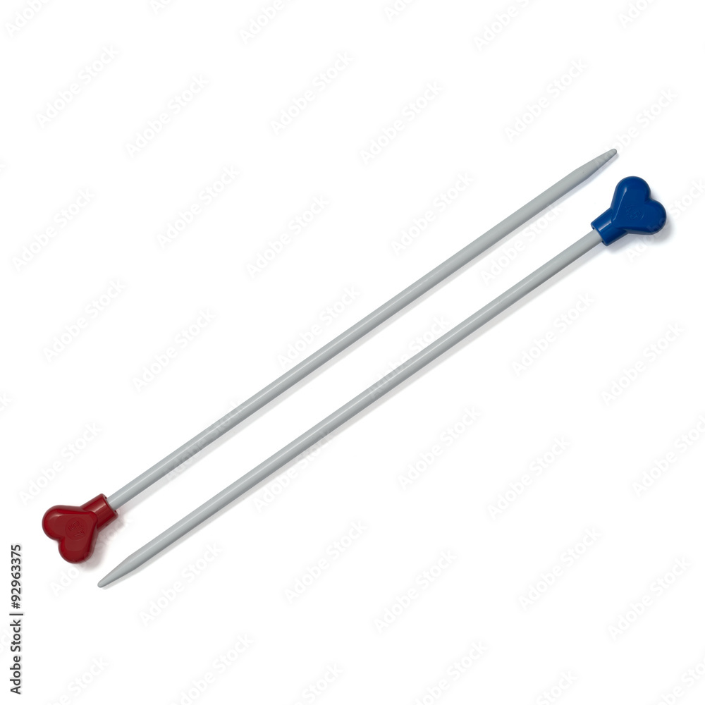 Pair of Plastic Knitting Needles on White Background Pair of Plastic Knitting Needles on White Background