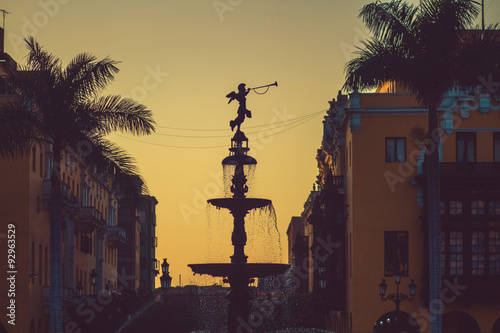 Municipal Palace and fountain, Plaza de Armas, Lima, Peru photo