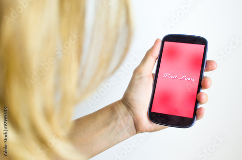 woman flirt app smartphone find love over internet mobile phone photo