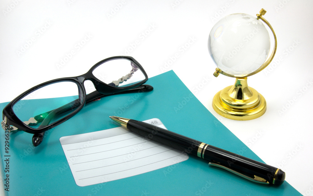 Fototapeta premium Notebooks, pens, glasses