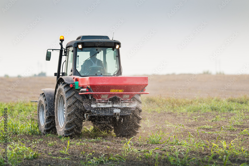 Fototapeta premium Tractor and fertilizer