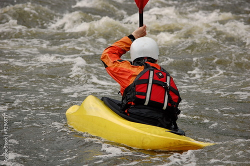 Kayaker training on a rough water. Southern Bug river, Ukraine. 