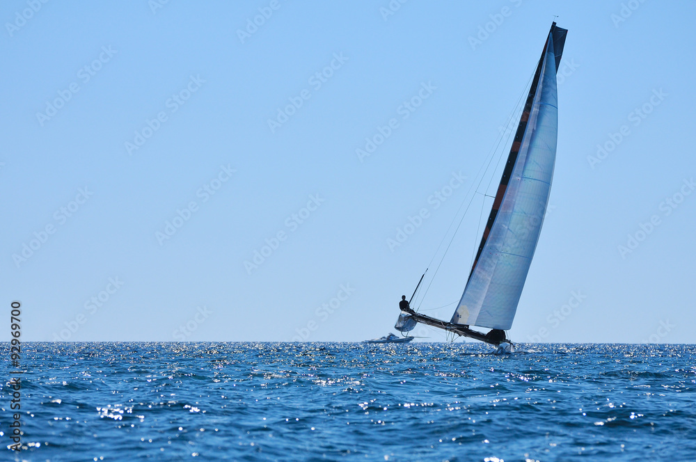Obraz premium alone crew catamaran