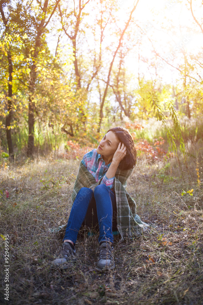 Girl sitting on the grass. Girl sitting on the grass.