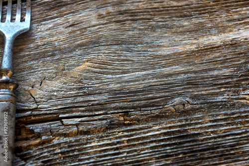 Billede på lærred rustic fork on wooden table