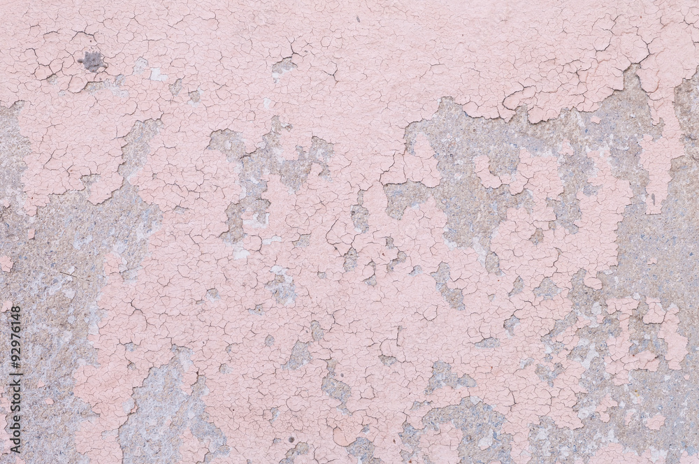 Closeup pale color and peeling of painted pink cement wall texture background